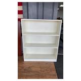 Solid wood painted bookshelf.  Measures 36x44x11