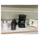 2 coffee makers, can opener, vacuum all untested