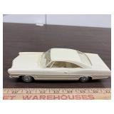 Ford car, plastic, marked "amt", cream color