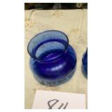 Call Bob blue vase, and sugar bowl. Has a small