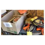 Two Orange ratchet straps, hand, pump, rope,