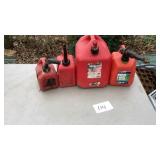 4 gas cans- 5 gallon, 2 gallon, 2 one gallon