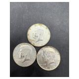 3- 1969 Kennedy half dollars