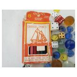 Good ship pencils dice and marbles